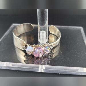 Handmade silver bracelet made from spoon with pink stones